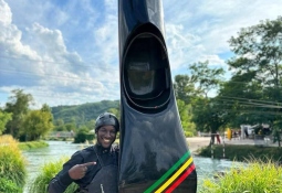 Wally Ndiaye holding his kayak at competition Wally Ndiaye Paddler